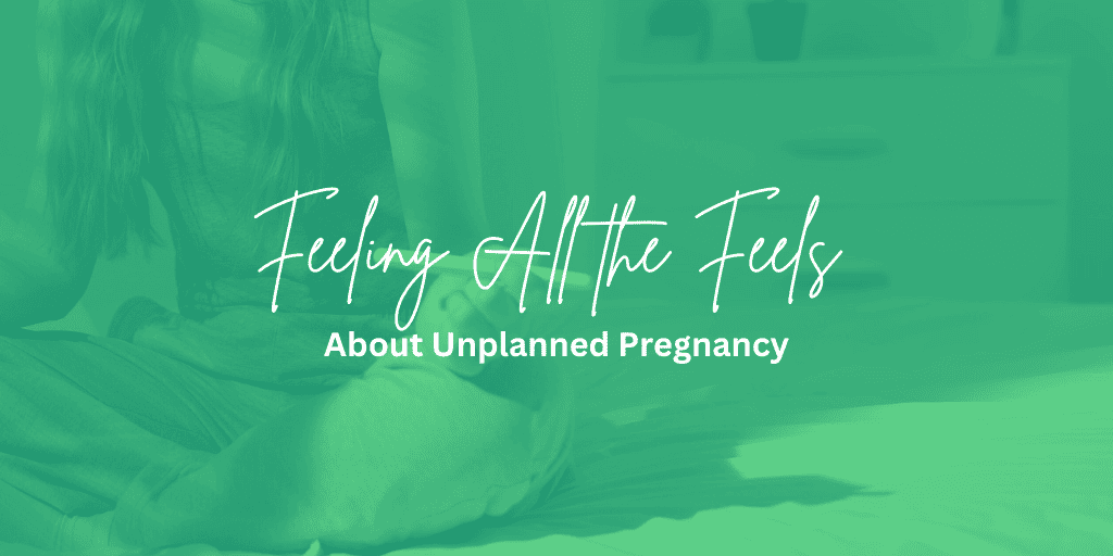 Young woman sets on her bed holding a pregnancy test. Feeling all the Feels About Unplanned Pregnancy