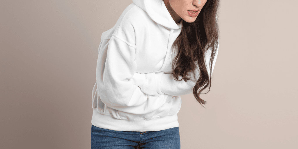 woman experiencing physical discomfort